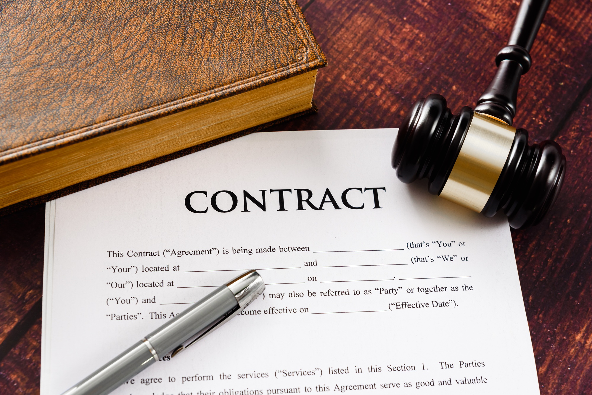 Legal contracts are subject to commercial disputes resolved in the courts of justice